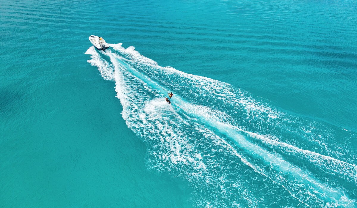 Man jumping off yacht at Kandima Maldives