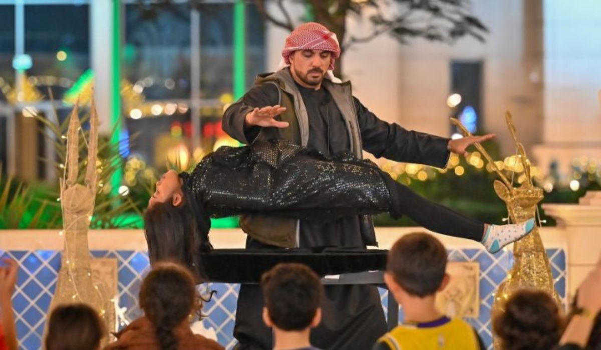 Mentalist Moein Al Bastaki performing a levitating trick